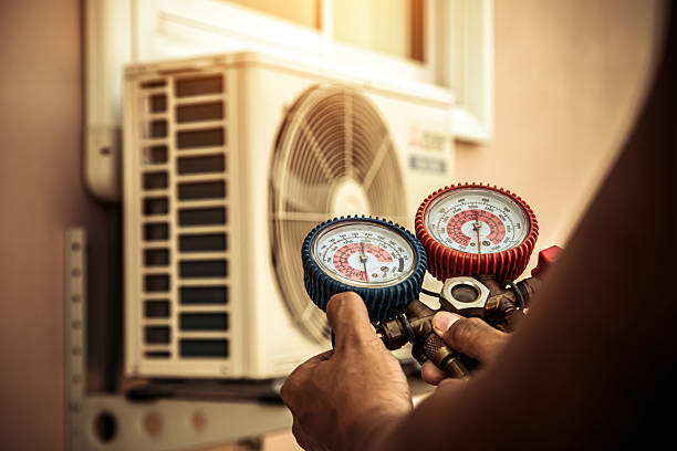 Professional Heat Pump Repair technician working in Westport, KY